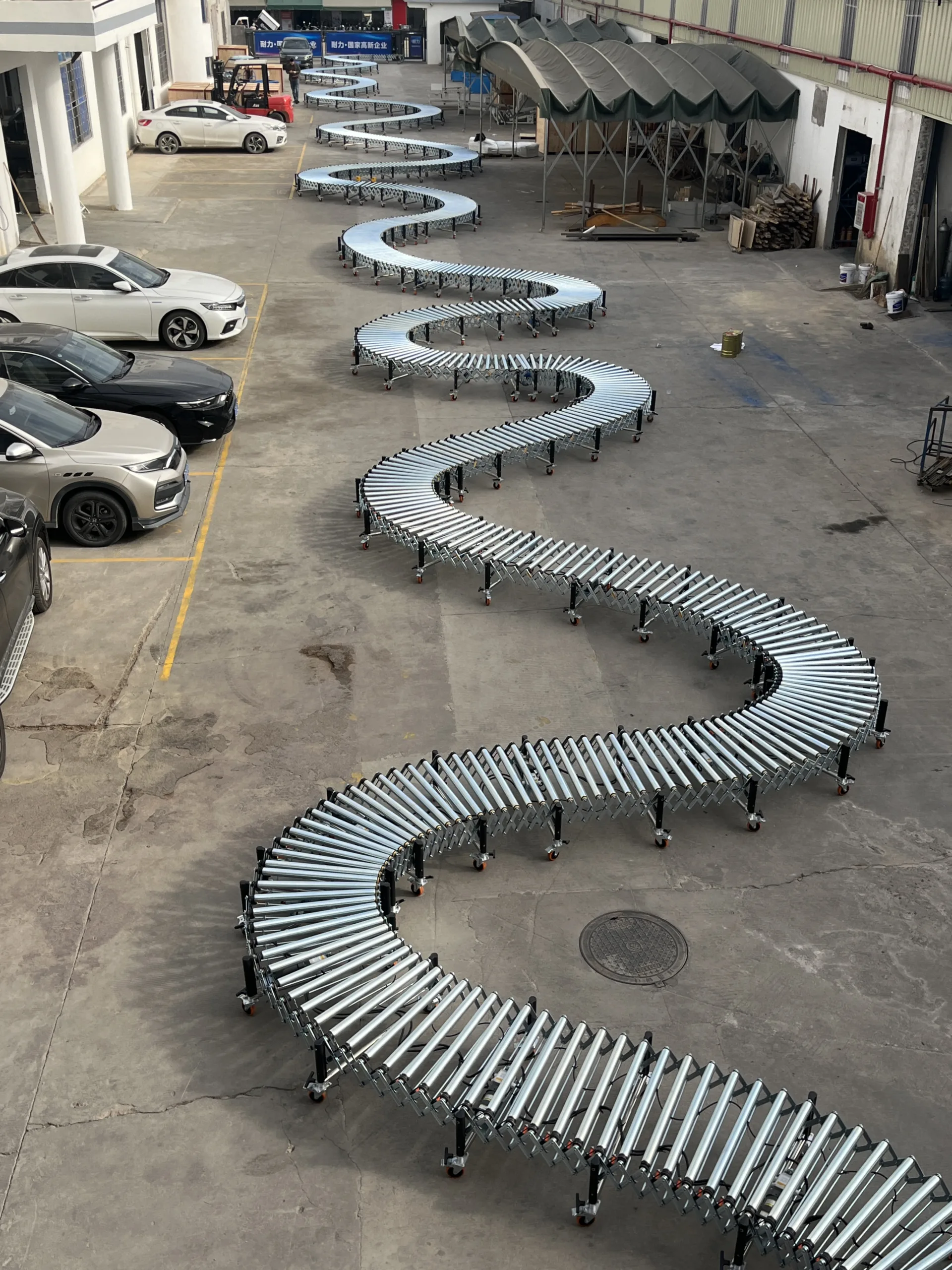 Super Long Expandable & Flexible Roller Convey by Naili Conveyor