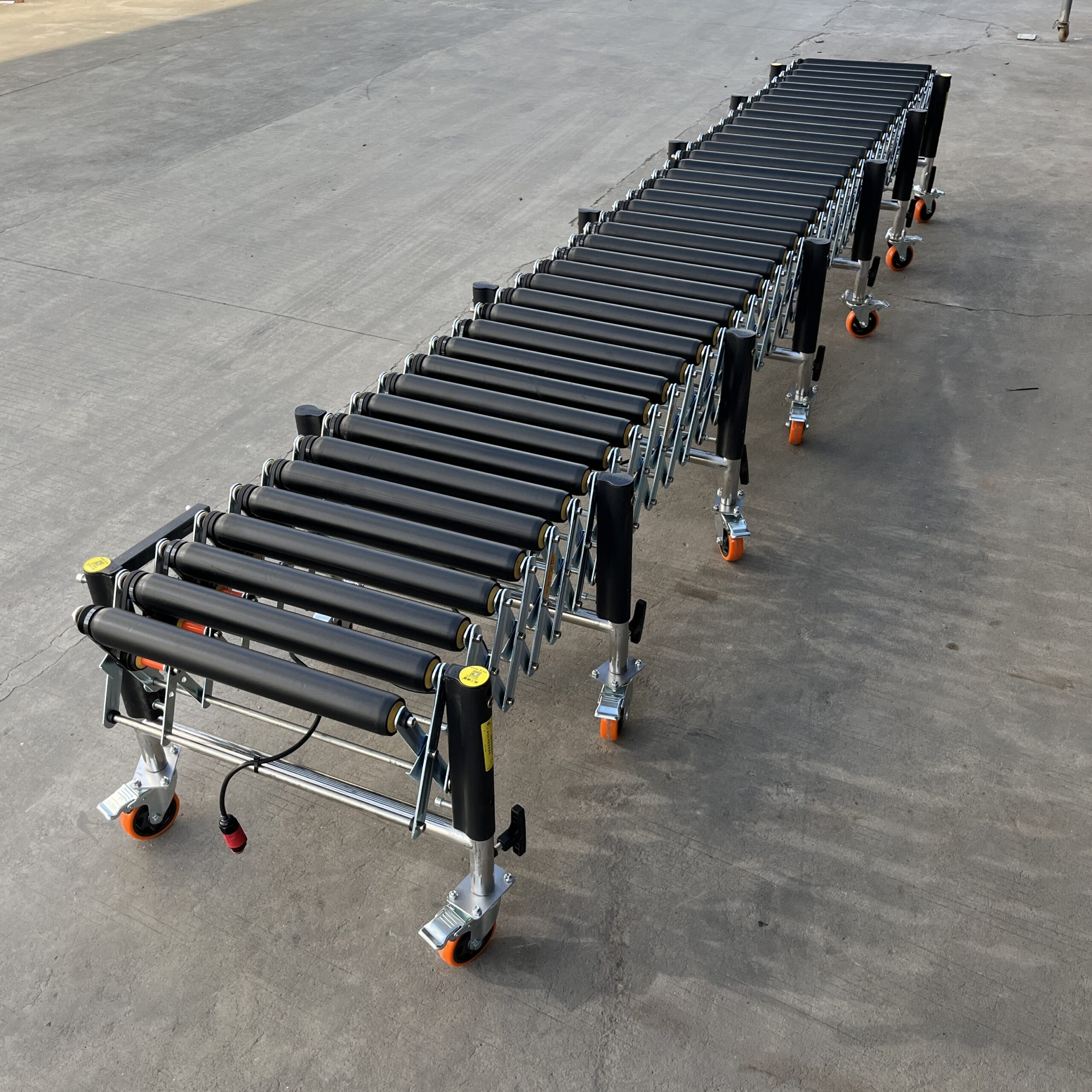 Powered Rubber Roller Conveyor - Multi-wedge Belt Driven