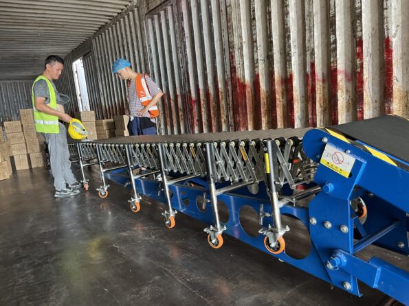 Naili Conveyor Customer Case - Multi-wedge Belt Powered Roller Conveyor over the hydraulic conveyor in Container Loading and Unloading